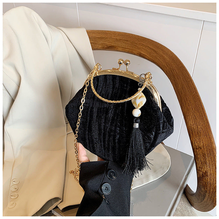 Elegant Velvet Handbag with Gold Chain and Tassel Decoration
