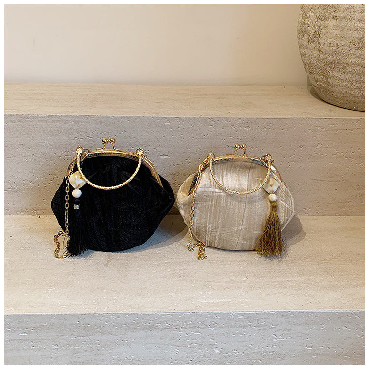 Elegant Velvet Handbag with Gold Chain and Tassel Decoration