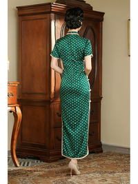 Vintage Green Polka Dot Cheongsam with Mandarin Collar and Pearl Detailing