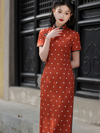 Elegant Orange Polka Dot Cheongsam with Green Accents