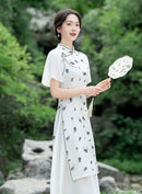 Elegant Floral Print Chinese Style Dress with Short Sleeves and Flowing Hemline