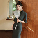 Elegant Dark Green Cheongsam Dress for Women with Half Sleeves and High Slit