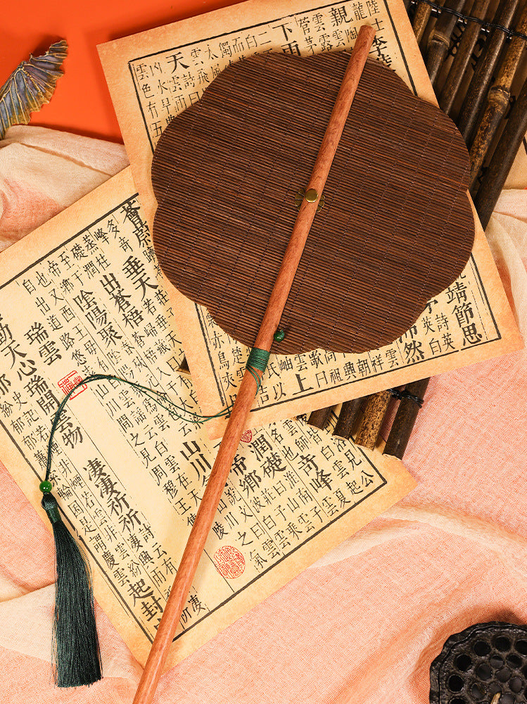 Handcrafted Bamboo Folding Fan With Wooden Handle And Traditional Design