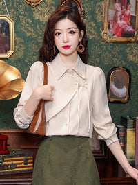 Elegant Beige Blouse with Chinese Knot Detailing for a Traditional and Stylish Look