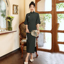 Elegant Dark Green Cheongsam Dress for Women with Half Sleeves and High Slit