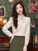 Elegant Beige Blouse with Chinese Knot Detailing for a Traditional and Stylish Look