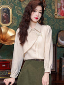 Elegant Beige Blouse with Chinese Knot Detailing for a Traditional and Stylish Look