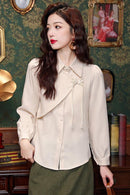 Elegant Beige Blouse with Chinese Knot Detailing for a Traditional and Stylish Look