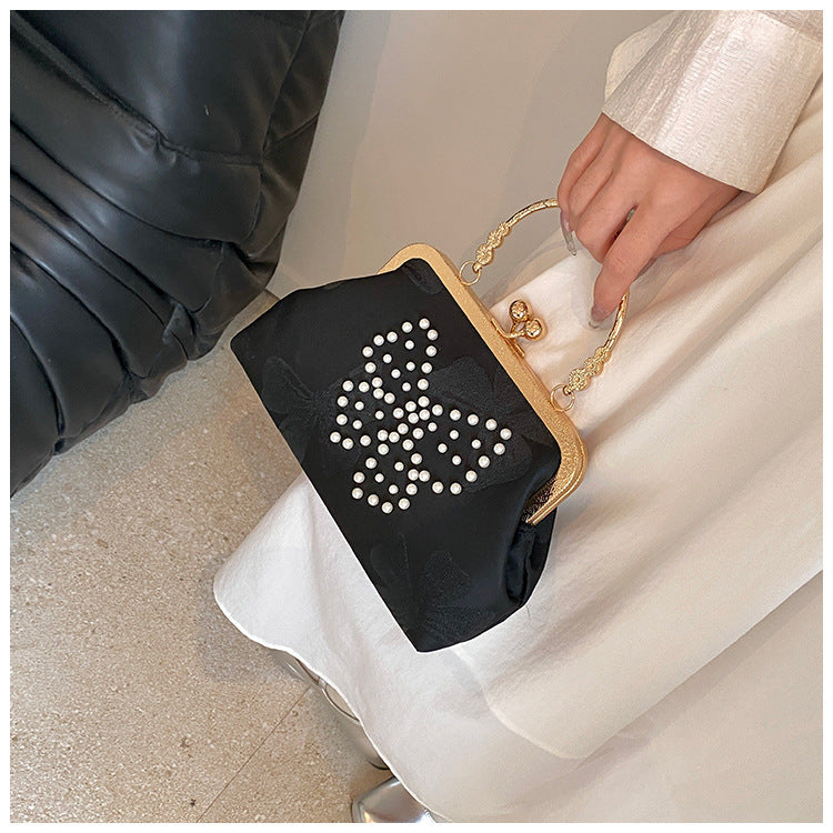 Elegant Pearl-Embellished Butterfly Clutch Bag with Golden Frame