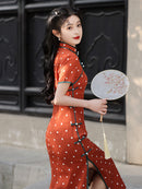 Elegant Orange Polka Dot Cheongsam with Green Accents