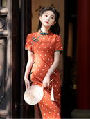 Elegant Orange Polka Dot Cheongsam with Green Accents