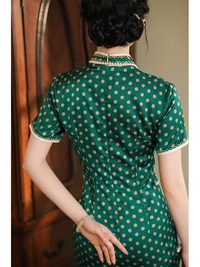 Vintage Green Polka Dot Cheongsam with Mandarin Collar and Pearl Detailing