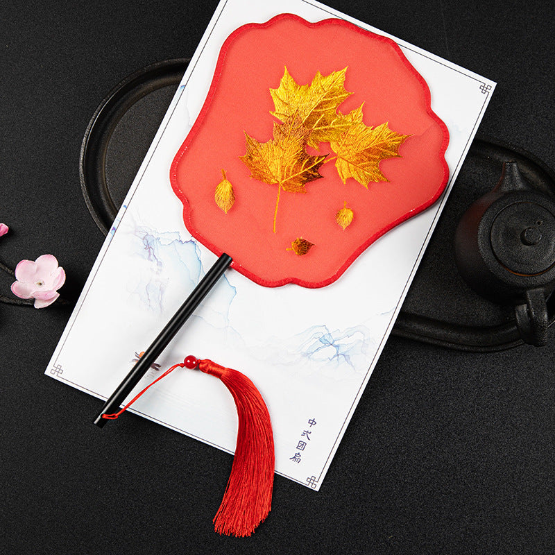 Traditional Chinese Round Silk Fan With Gold Leaf Design And Red Tassel