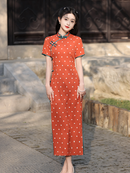 Elegant Orange Polka Dot Cheongsam with Green Accents