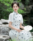 Elegant Floral Print Chinese Style Dress with Short Sleeves and Flowing Hemline