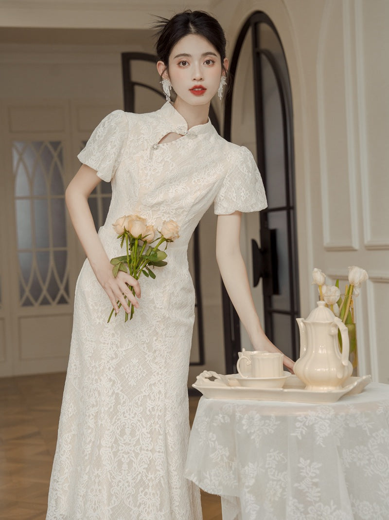 Elegant Lace Cheongsam Dress with Short Sleeves and Back Bow Design