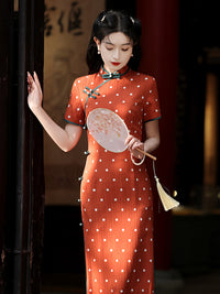 Elegant Orange Polka Dot Cheongsam with Green Accents