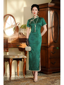 Vintage Green Polka Dot Cheongsam with Mandarin Collar and Pearl Detailing