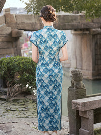 Elegant Blue Cheongsam with Floral Pattern and Mandarin Collar