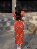 Elegant Orange Polka Dot Cheongsam with Green Accents