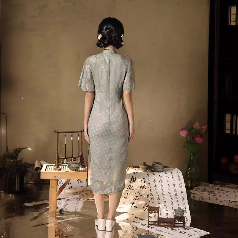 Elegant Green Floral Qipao Dress with Mandarin Collar and Side Slits
