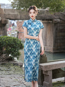 Elegant Blue Cheongsam with Floral Pattern and Mandarin Collar