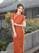 Elegant Orange Lace Cheongsam Dress with Traditional Detailing