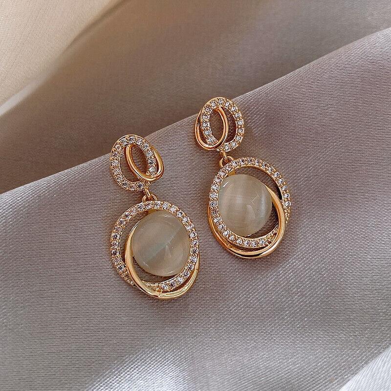 Gold Oval Drop Earrings