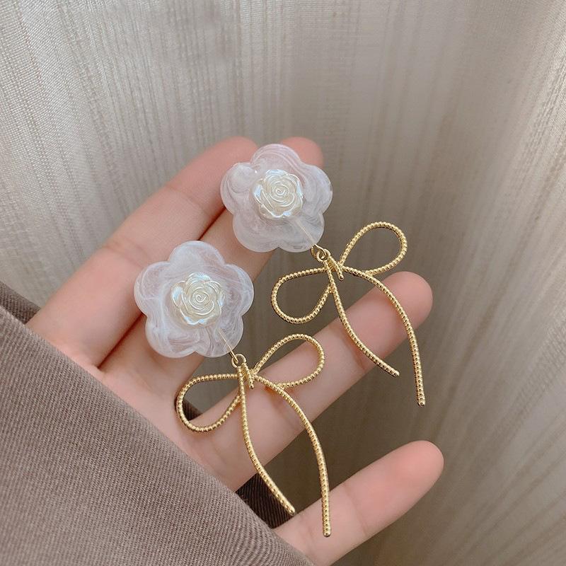 Floral Earrings With Delicate Bow Design